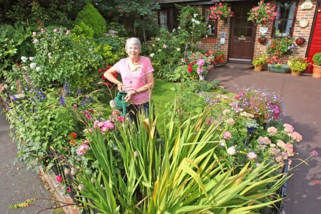 Val Stringer in Saxon Road, one of the best front garden winners DM16139475a