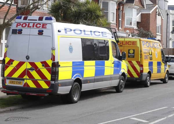 Police outside the address in Aldwick Road, Bognor Regis, in April. Picture by Eddie Mitchell