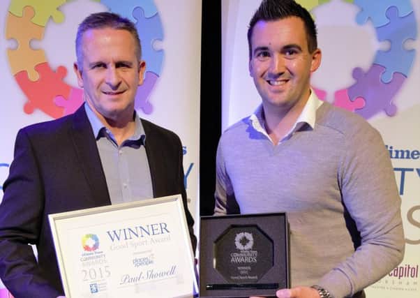 West Sussex County Times Community Awards 2015. Good Sport winner Paul Showell with Tim Bolton from People and Places -  picture by Josh Smith for SMedia Group SUS-151117-163118001