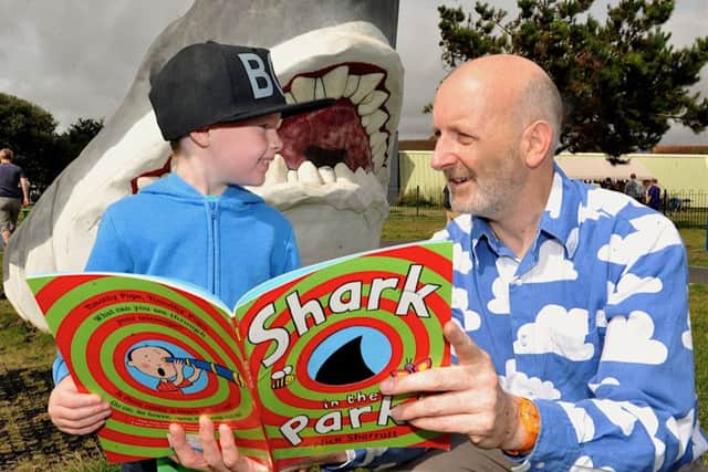 Jayden Bazen with children's author Nick Sherratt, who opened the Fishersgate Funfest.
