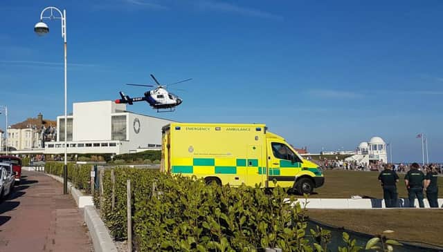 The air ambulance and South East Coast Ambulance Service on the De La Warr Pavilion terrace. Photo by Sean Cassidy SUS-160830-173020001