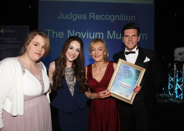 DM16112608a.jpg Observer and Gazette Business Awards presentation evening, 2016. Hospitality Tourism and Leisure - judges' recognition award to Novium Museum presented by Bradley Hackett, Network Fontwell Business Club. Photo by Derek Martin SUS-160423-032815008