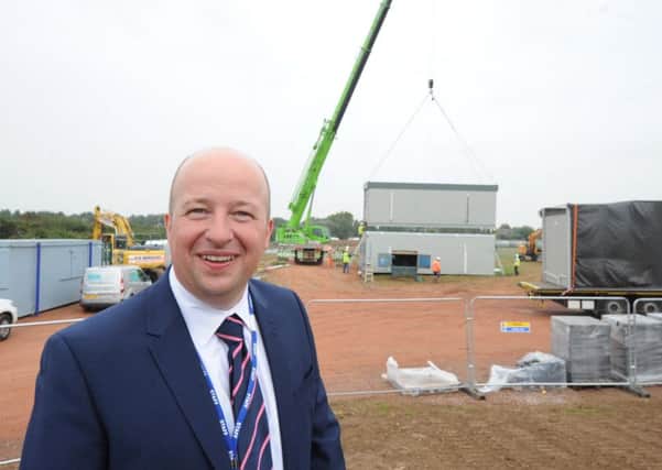 Head teacher Tom Garfield is delighted to see the temporary school village starting to be built. Kate Shemil   ks16000968-1 SUS-160920-170046008