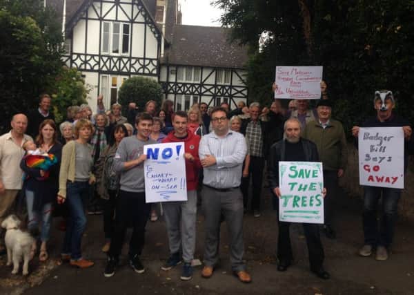 Cllr Rob Lee pictured with angry residents