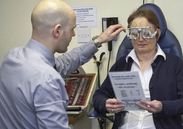 A patient having an eye examination SUS-160709-092700001