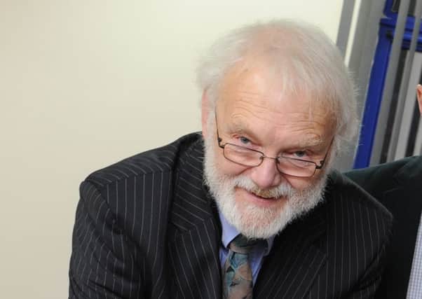 Roger Wilton, pictured in 2014, said that they would only meet the North Horsham developer in public