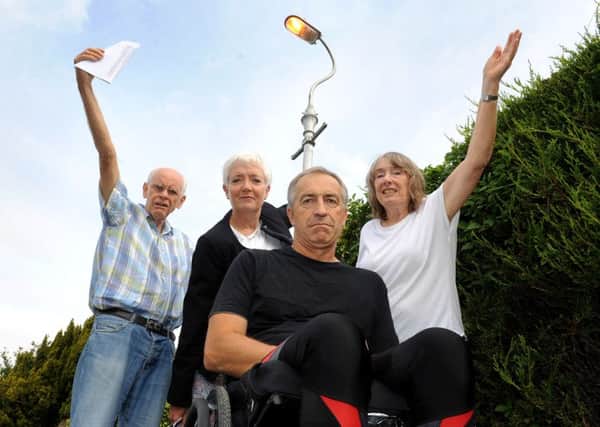 Bill and Janice Kent (back row at edges) and with neighbours Ian Maskell, 
and Sue Deane are being kept awake at night by a streetlight - which are on 24 hours - shining into their bedrooms. Pic Steve Robards  SR1625326 SUS-160209-160151001