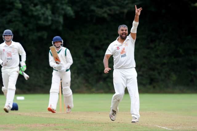 CRICKET: Sussex League Division 2: Ifield (fielding) v Lindfield. Jigar Parekh (bowling) claims the wicket of Will Longley.  Pic Steve Robards SR1625472 SUS-160509-122835001