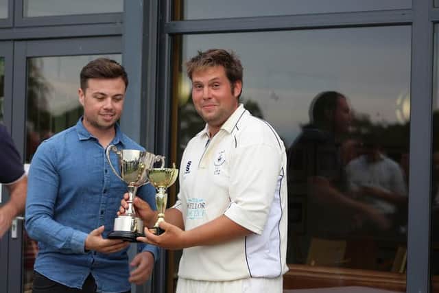 James Askew receives the T20 Cup trophy from Sussex cricketer Matt Machan. Picture: Amjad Mohsin