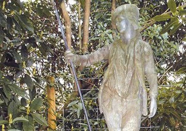 Statue stolen from Nymans Garden, Handcross SUS-160609-123547001