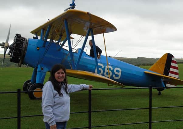Jacqui Pullen completes wing walk for charity