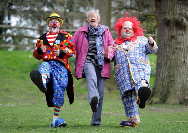 Bluey the Clown, Rosemary Warren (Chairman of Hotham Park Heritage Trust), and clown Bibbledy Bob and at Hotham Park.  Pic Steve Robards