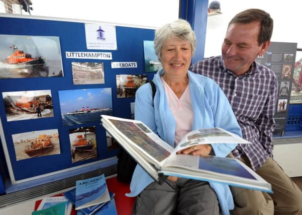 Elaine and David Cordingley looking at the Lifeboat exhibition at the Look and Sea Centre