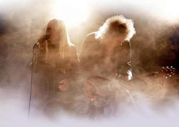 Queen guitarist Brian May joins West End star Kerry Ellis for an acoustic performance