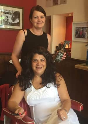 Kings Barbers of Horsham owner Helen Andreou and Samantha Mulholland