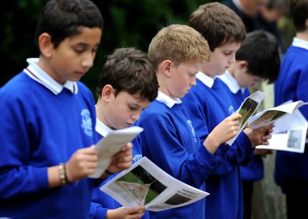 Annual memorial service for bombing of Petworth Boys School, remembered by children of Petworth Primary School. Pic Steve Robards  SR1628603 SUS-160929-165700001