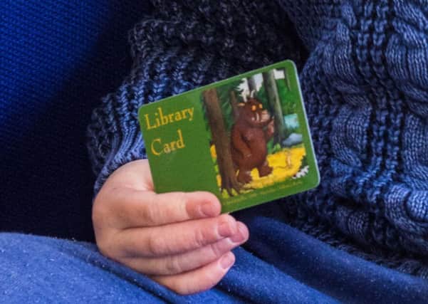 Sam Ismail with his new Gruffalo library card (photo submitted). SUS-161209-104759001