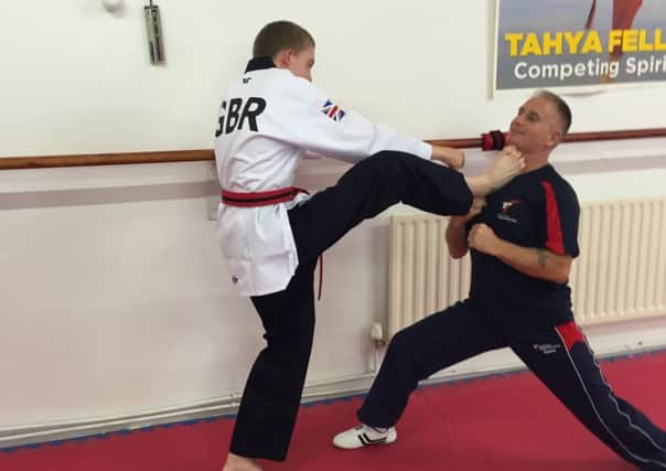 Alex Hutchings in training at Living Well Livingwell Taekwondo Club  at Horley Leisure Centre - submitted