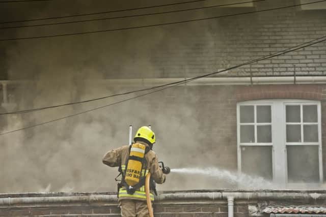 Firefighters tackle the pet shop blaze in Hurstpierpoint