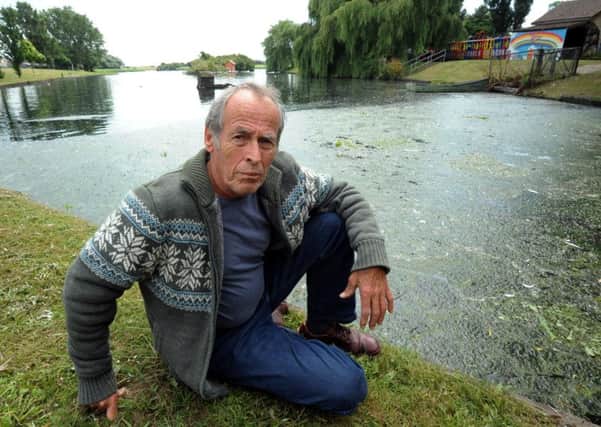Walter Smith is concerned about the state of the lake at Brooklands Pleasure Park