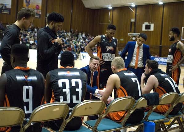 Worthing Thunder head coach Daniel Hildreth chats with his team last season. Picture: Andre Nichols