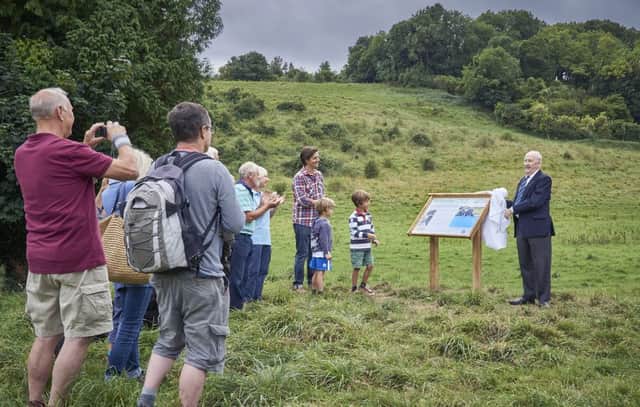 Gilbert Saunders unveiling the information board at Steyning Rifle Range. Picture Matthew Thomas