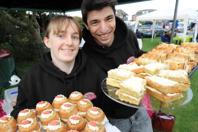 Carla Hornby with her cakes and Ivan Iliev with his home made sausage rolls