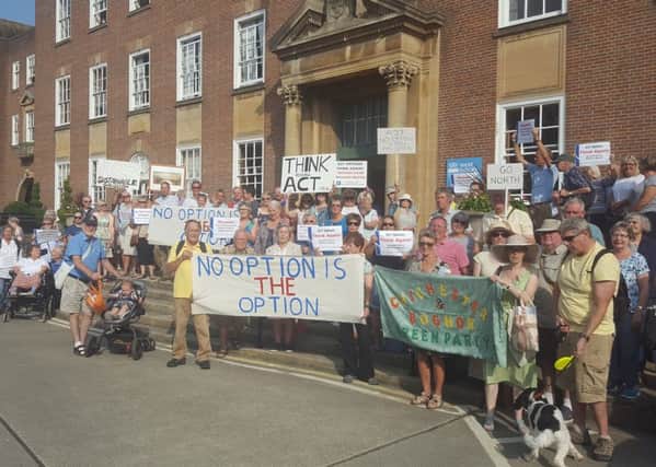 residents outside County Hall before county councillors discussed the aurthority's response to a Highways England consultation on future options for the A27 at Chichester. SUS-160915-132728001