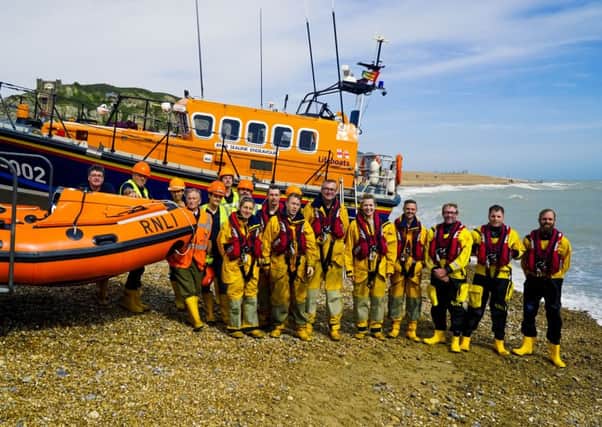 Hastings Lifeboat crew and launchers with Amber Rudd and other visitors after the lifeboat exercise SUS-160915-153436001