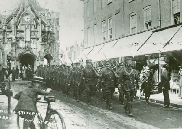 Territorials, probably 4th battalion Royal Sussex Regiment, leave Chichester on August 5 1915 Picture: West Sussex Record Office RSR/PH/4/38