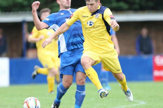 Reece Butler in the thick of the action against Barton. Picture courtesy Scott White