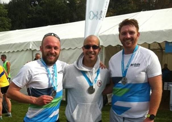 Matt Quinton, Michael Burke and Oliver Farr at the Reigate Half Marathon on Sunday