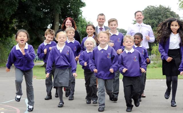 Staff and pupils at Portfield Primary Academy celebrate their 'good' Ofsted rating.