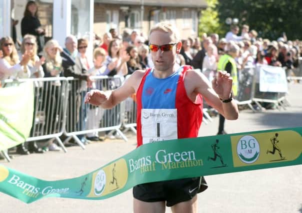 DM151178137a.jpg Barns Green Half Marathon, 2015. The winner James Baker. Photo by Derek Martin SUS-150927-155229008