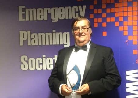 Ian Taylor accepts the Volunteer Sector Award for Shoreham Airshow volunteers