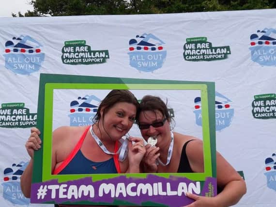 Zoe Britton and Tracey Taylor after completing their swim