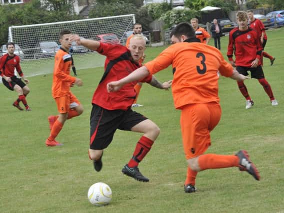 Action from Rye Town's game at home to The JC Tackleway in Division One. Picture by Simon Newstead