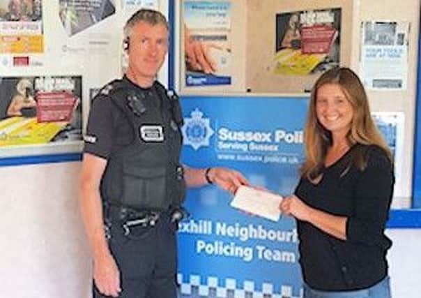 PC Jason Kemp making the presentation to NAS committee member Gemma Cook SUS-160923-104558001