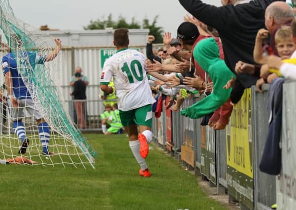 Ollie Pearce celebrates opening the scoring against Tonbridge / Picture by Tim Hale