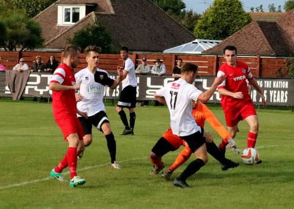 Pagham in action against Horsham YMCA - before beating Broadbridge Heath three nights later / Picture by Roger Smith