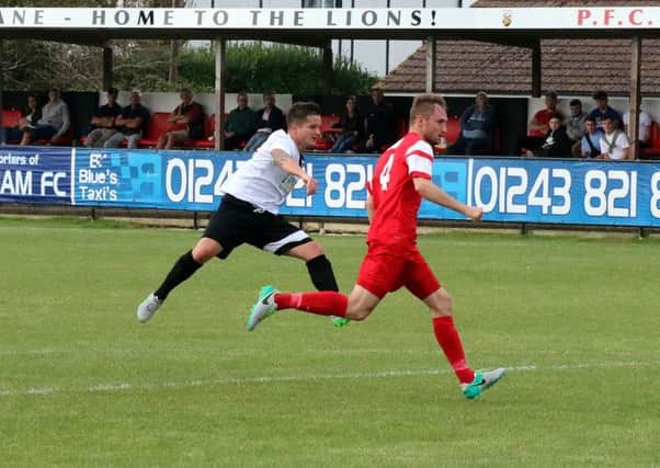 Pagham in recent action against Horsham YMCA / Picture by Roger Smith