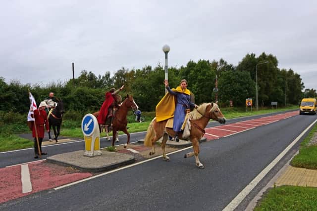 The marchers had more modern routes to content with than King Harold would have done. Here they cross the A19 outside of York. Picture: Anthony Chappel-Ross for English Heritage SUS-160929-143932001