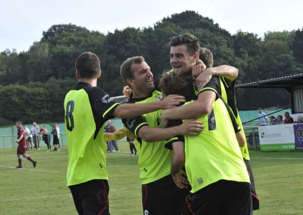 Wick players celebrate their second goal on Saturday. Picture: Simon Newstead