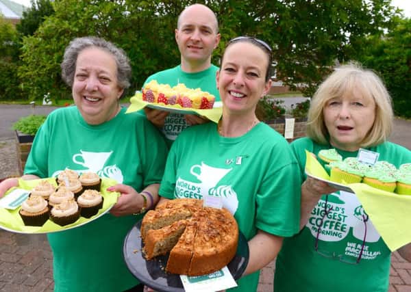 Frankie Plastow, left, and her daughter Petrina, second right, will be holding their 11th Macmillan coffee morning at Panzas House in South Ferring