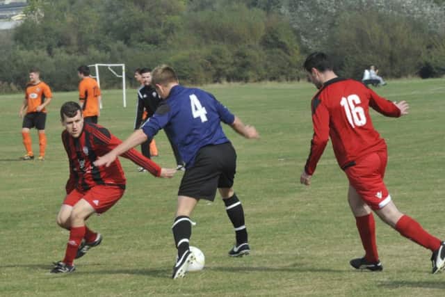 Hollington United II on the ball against Hastings Rangers. Picture by Simon Newstead