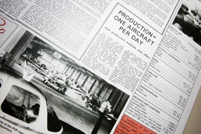 A newspaper clipping of a story about the factory