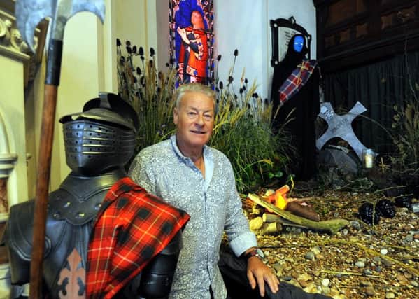 Florist Jonathan Davidson with the depiction of Macbeth he made with Netta Millar. Pictures: Kate Shemilt ks16000197-3