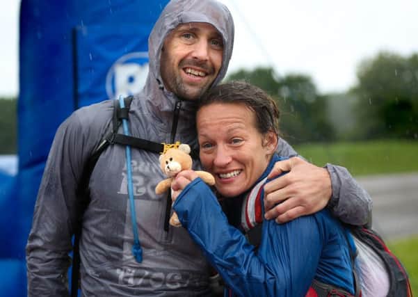 Shelley and Mark faced a downpour two miles from the finish line