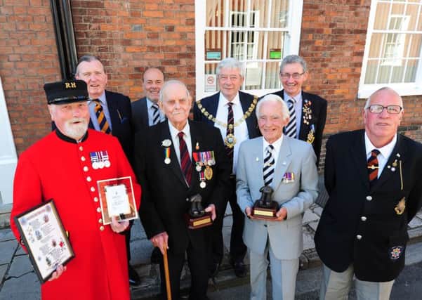 ks16000206-1  The Chichester branch of the Queeen's Regiment Association Long Service Award recieved their awards at the Chichester City Club. Front left to right the recipients: Mick Kipping, Capt Len Butt, John White and Trevor Cox. Back left to right also present at the ceremony: Colonel Roderick Arnold, Eddie Drew, the Mayor of Chichester, Peter Budge, and Dave Tilley.
