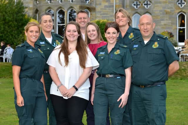 Imogen Guest with some of the SECAmb staff who saved her. Picture: SECAmb